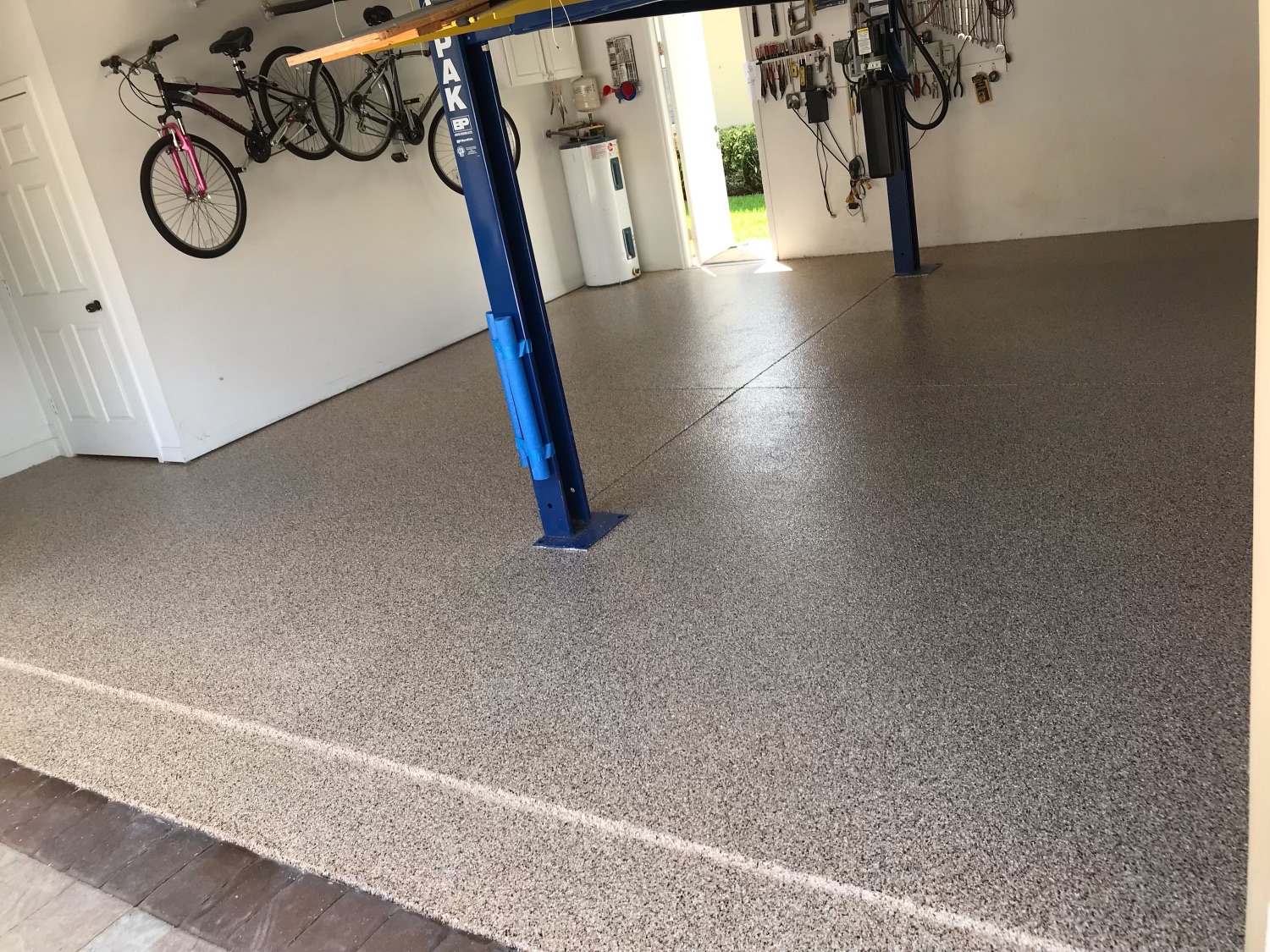 Epoxy garage floor blue grey flake residential caution