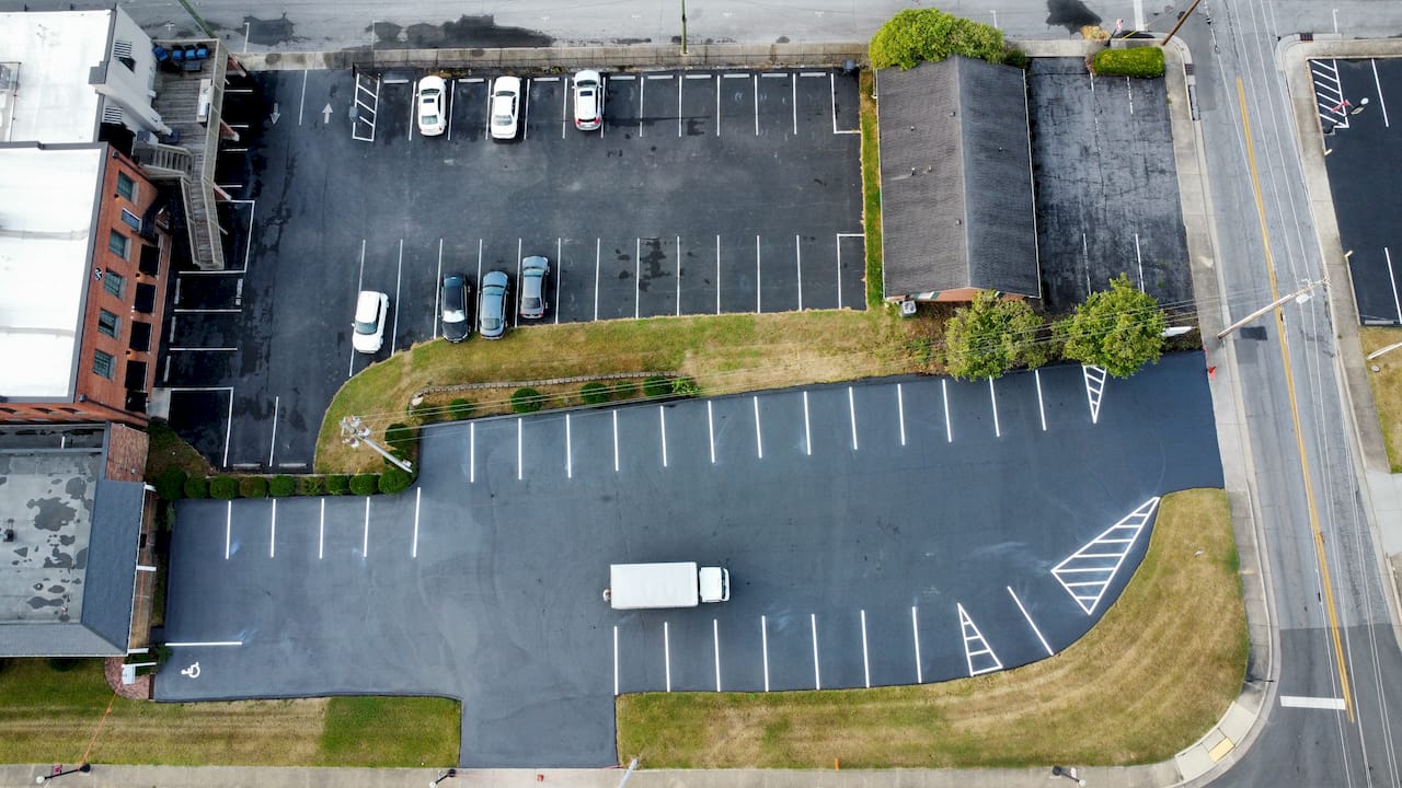 Commercial parking lot sealcoating striping aerial southeast