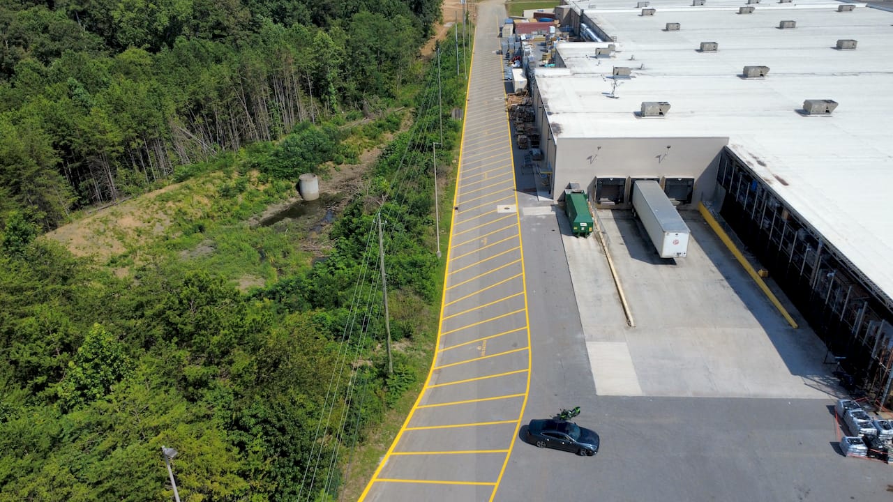 Warehouse dock asphalt striping yellow lines