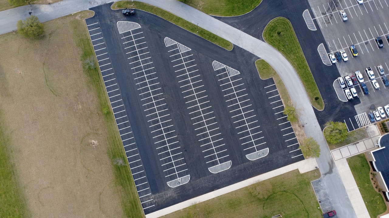 Commercial parking lot striping aerial view southeast