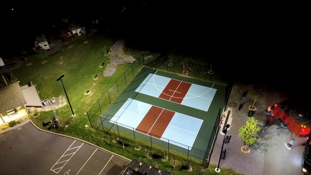 Pickleball basketball multi court night lighting aerial